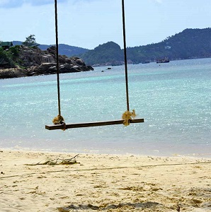 rope swing at peaceful beach