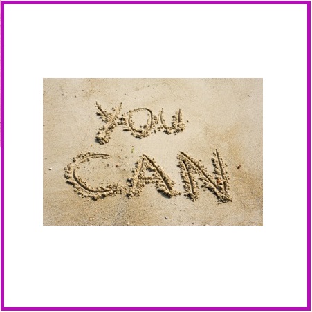 motivational words written in sand