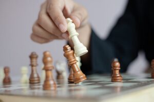 Close up of woman playing chessn