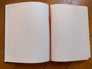 An open paper-blank book
