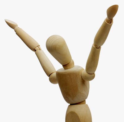 wooden mannequin with hands up exulting Success concept